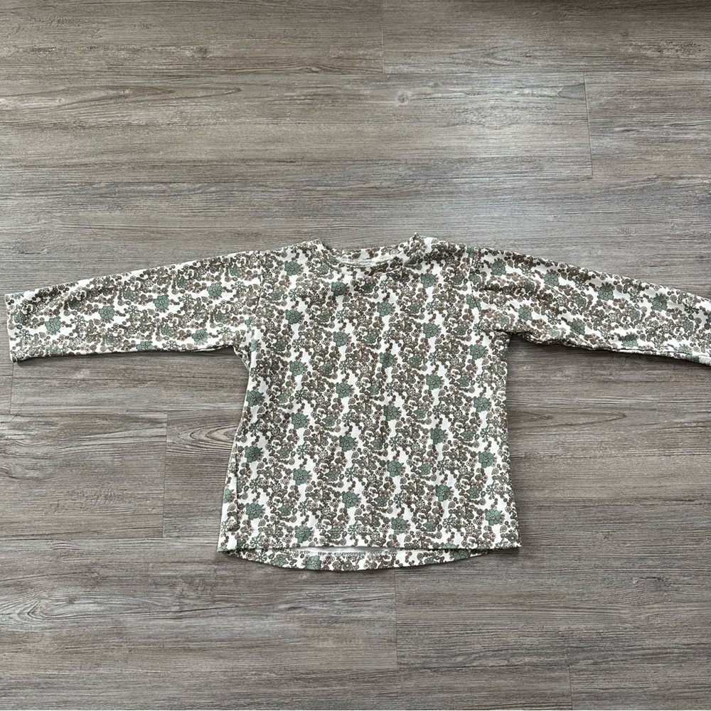 Kate Quinn floral shirt